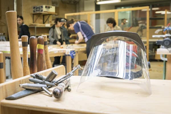A large wooden construction on display in a workshop at Central Saint Martins