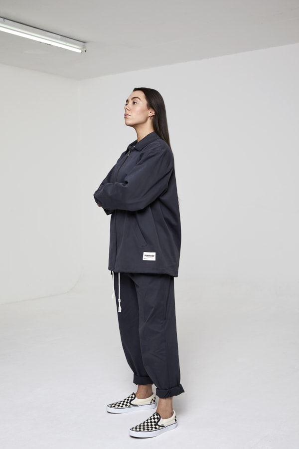 Woman standing wearing streetwear