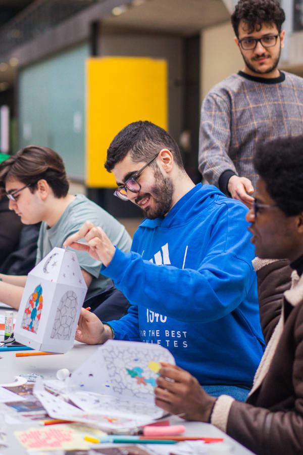 people making paper lanterns