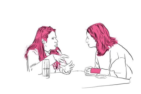 An illustration of two female presenting people talking in black and white with pink hair
