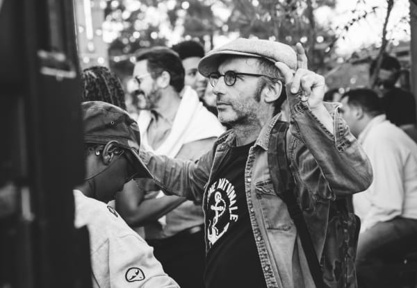 Festival attendees dance at the Fête de la Musique concert at the Palais de la Porte Dorée Paris, curated and produced by Karina H Maynard