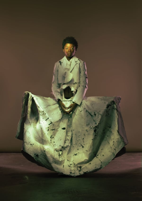 Figure wearing wide white dress 