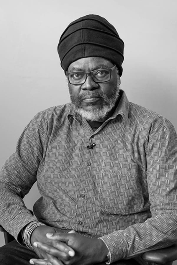 Black and white portrait of Saki Mafundikwa