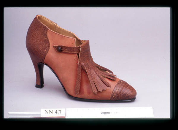 A heeled shoe. 