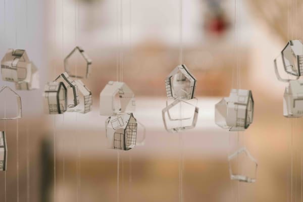 hanging paper sculptures on string