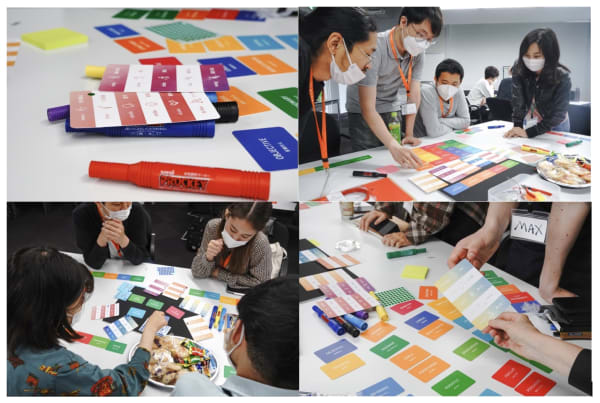 A group of people using colourful movement cards