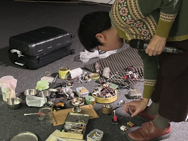 Workshop speaker working with physical computing devices