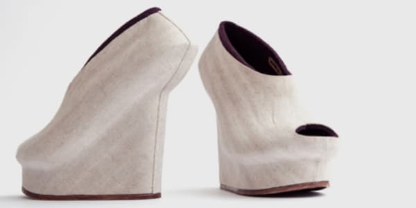 White modern shoes on a plain background