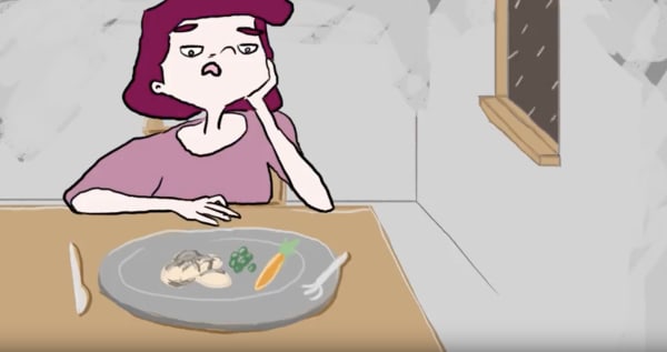 Image of cartoon drawn woman taken from animation sitting at dining table with her chin in her hands in front of plate with meat and vegetables