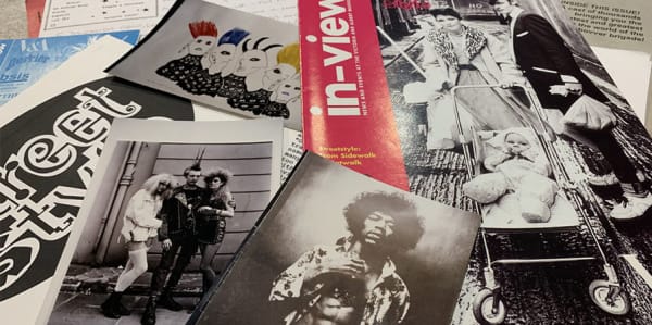 Close up image of magazines and vintage photographs