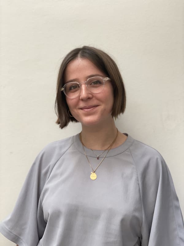 Portrait photo of a woman smiling at the camera