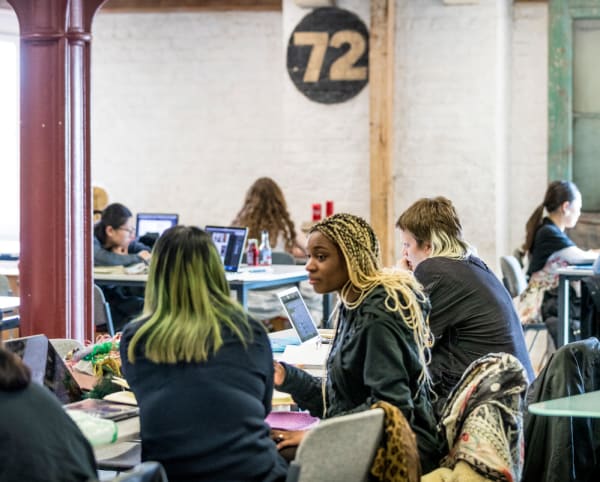 Students talking in the library