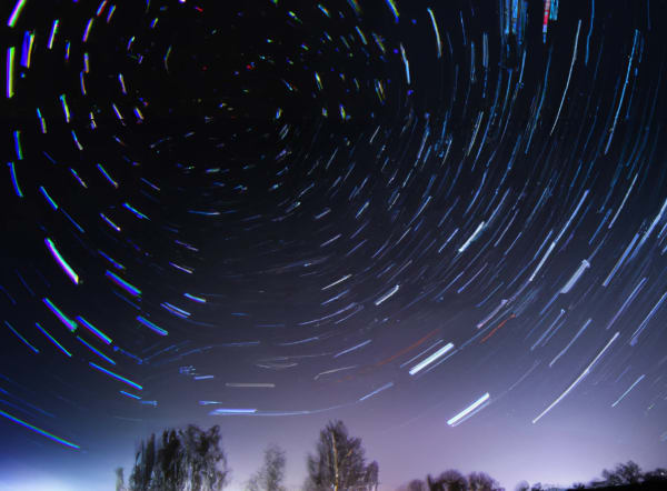 Timelapse of the stars at night creating a circular pattern