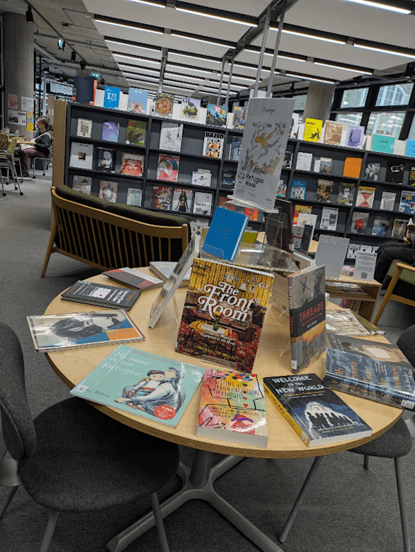 Library display featuring various books on round table