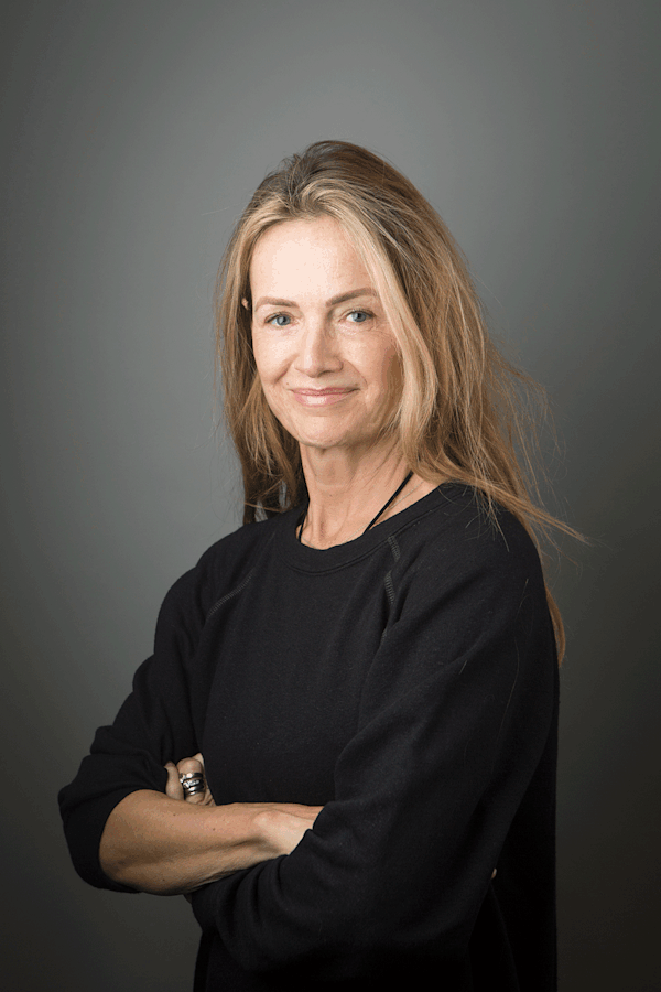 Professional photo of a woman crossing arms