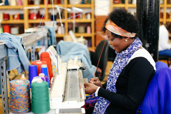 Student using a sewing machine in an LCF studio.