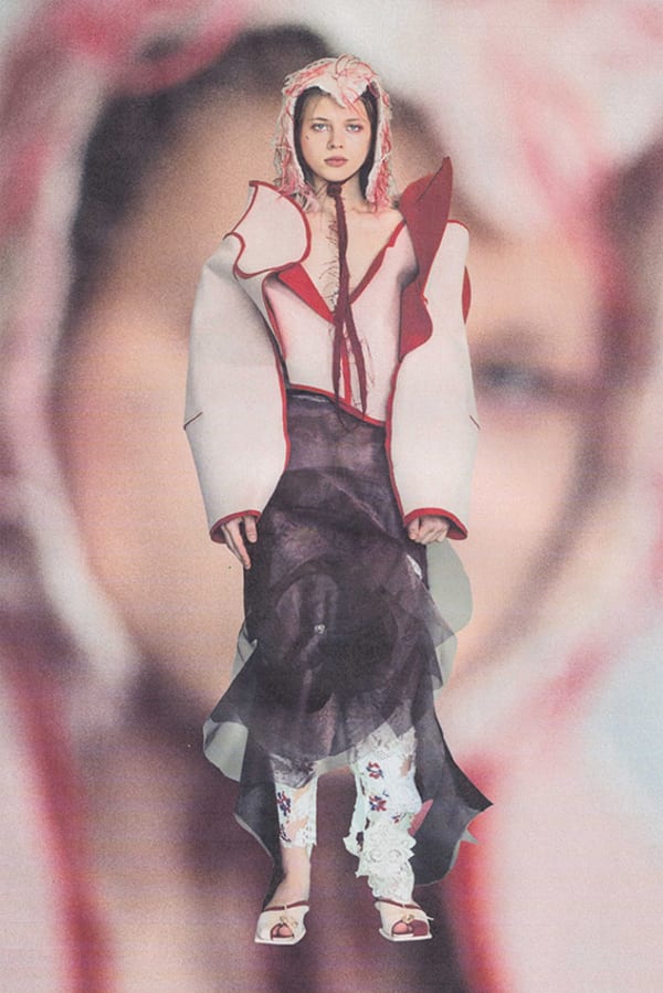 Figure wearing red and white garments collaged onto a portrait of a face