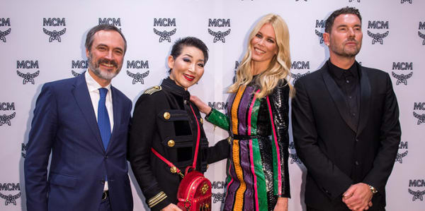 Sung-Joo Kim OBE - Honorary Doctor (centre) at MCM 40th Anniversary Event (with Paolo Fontanelli, Claudia Schiffer and Michael Michalsky)