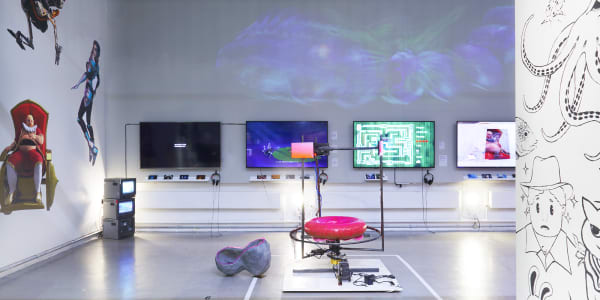 Exhibition view of multiple screen-based works by students.