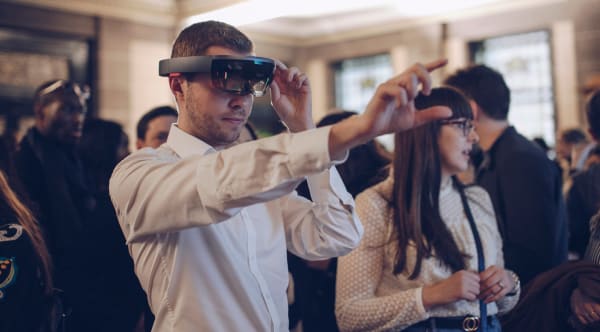 Immersive Fashion Retail Technologies Customer using a Virtual Reality headset