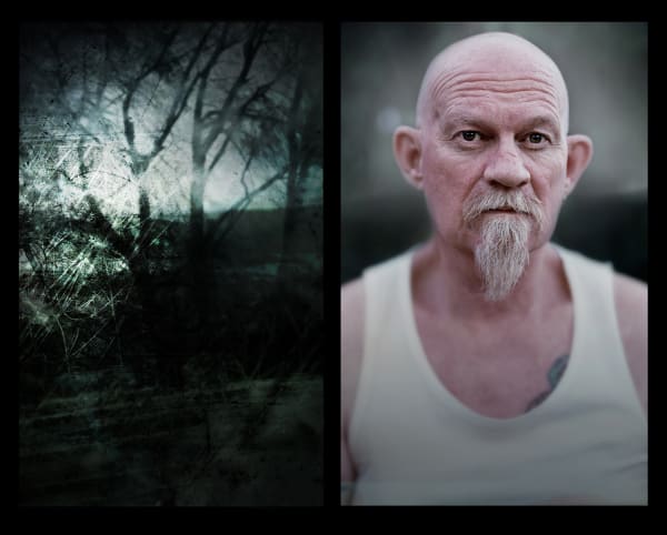 Photo portrait of a bearded man and a wooded landscape.