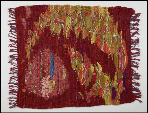 Woven item - prominent colours red, yellow and orange