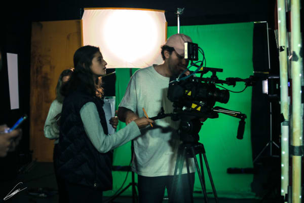 Students operating a camera in LCC's television studios. 