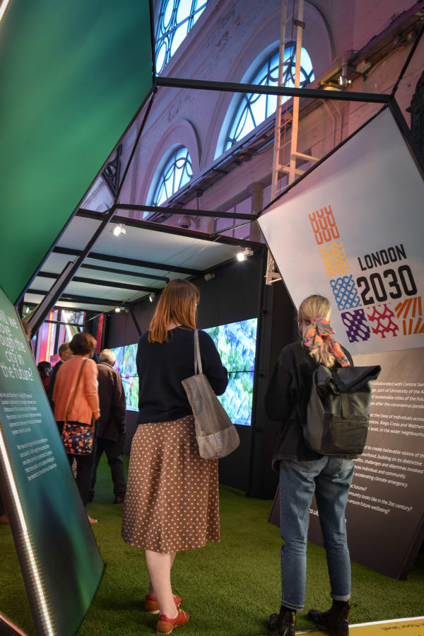 People viewing the London 2030 exhibition at the London Transport Museum