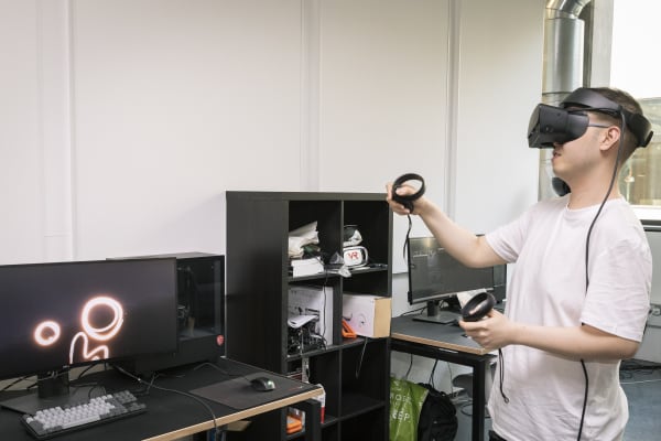 A student wearing a VR headset 