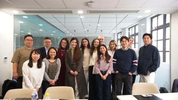 A group of people posing for the camera