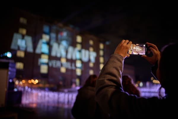 CSM's Granary Building at night lit up for Mammut