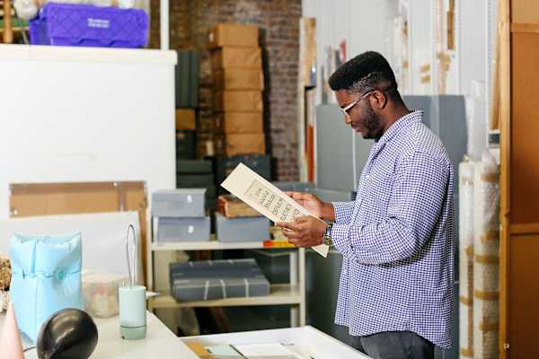 A researcher is working with materials in an archive