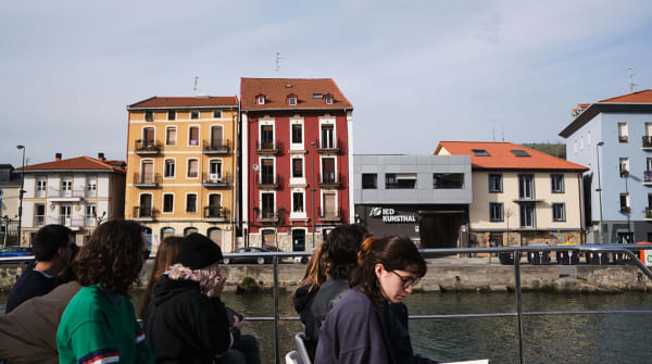 Image of houses taken from a boat.