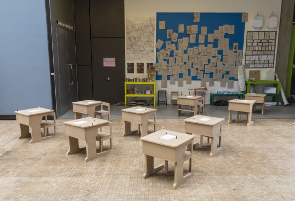 A group of childrens wooden school desks