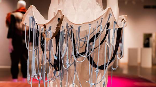 Garment skirt with ribbons of fabric hanging from it