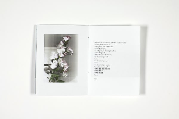 Hand bound book showing page with flowers