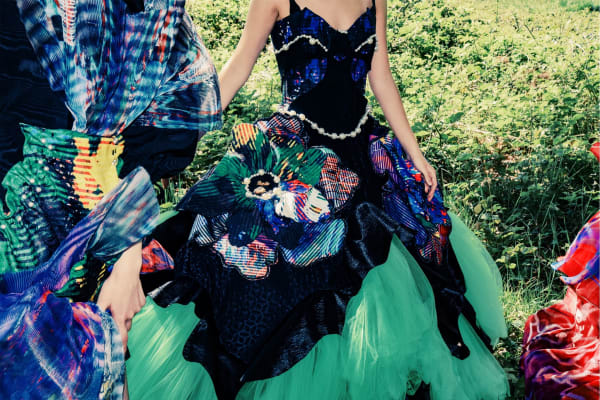 Vibrant, colourful dress with skirt inspired by a birdcage.