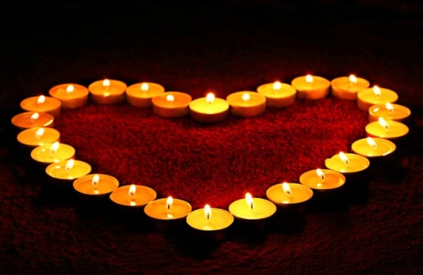 Image of a heart shape made from candles