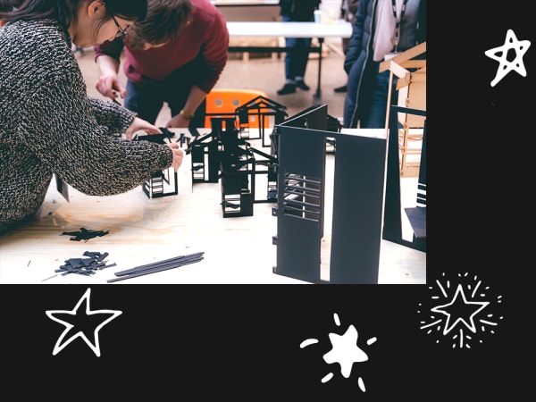 students building model structures