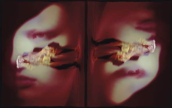 Photograph of a figure, standing upright but the orientation of the photo shows them sideways. There is a warped effect to the image, giving it a hazy look.