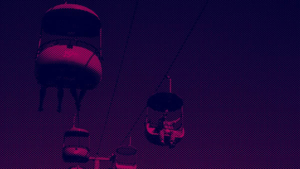 pink and purple duotone photo of a skylift 