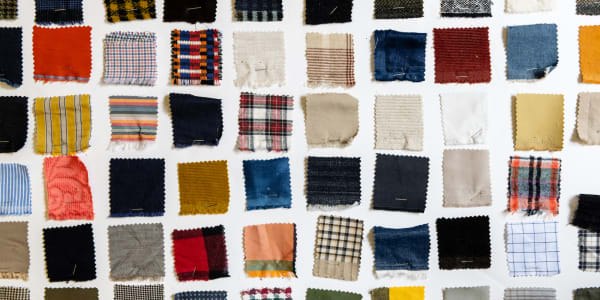 A collection of textile samples cut into squares