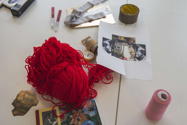 Magazine clippings, colourful yarn tape, scalpels, fabric strips and paper