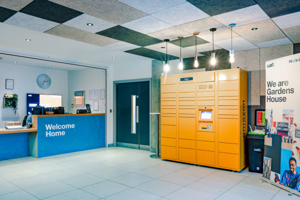 View of Reception, showing Welcome Home sign and Amazon parcel locker.