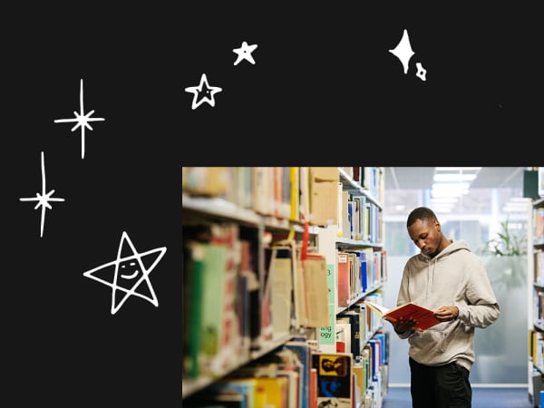 a student reading a book in the library