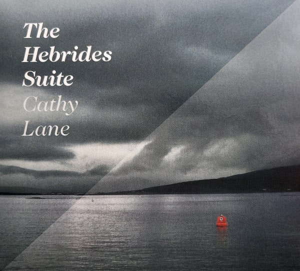 Moody landscape of dark cloudy day at a lake.