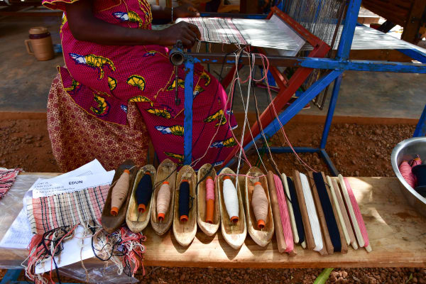 Edun Project textiles being created by artisans  in Burkina Faso
