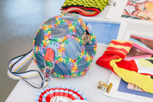 Fashion Knitwear exhibition showing a fashionable knitted bag.