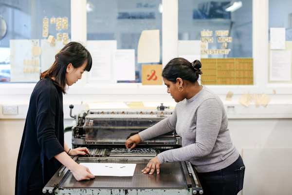 Student and a technician working in the Studio.