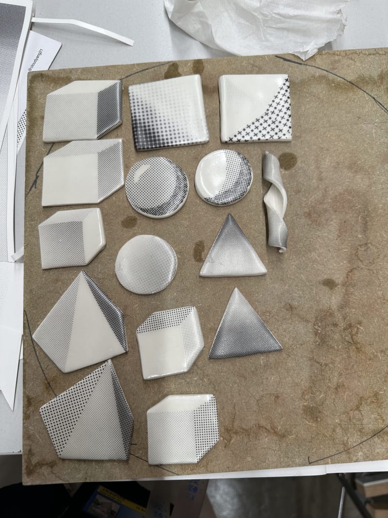 many ceramic pieces, different shape, they are 2d but looks like 3d.